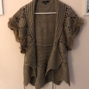 Brown/tan sweater with faux fur detail.